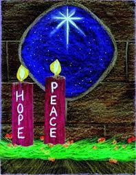 two advent candles labeled hope and peace 